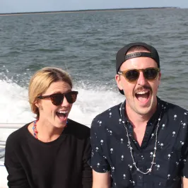 boy and girl smiling on boat
