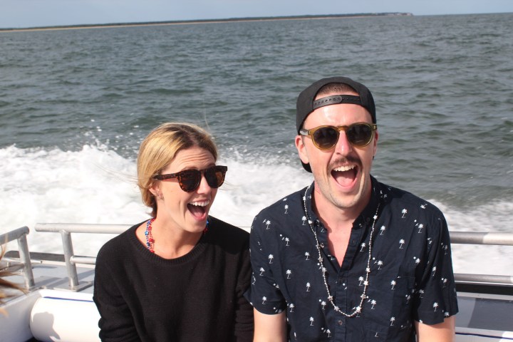 boy and girl smiling on boat