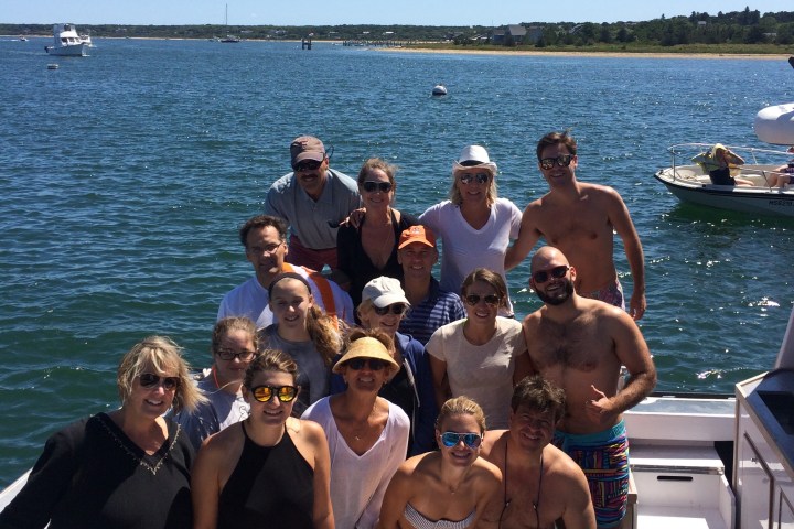 group posing on boat