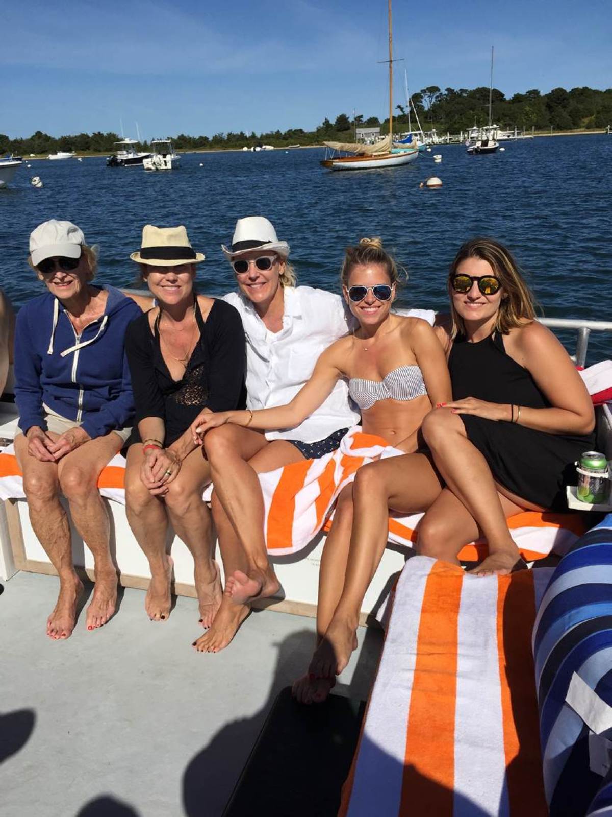 group posing on back of boat