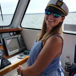 girl driving the boat