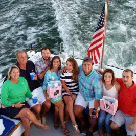 group posing on back of boat