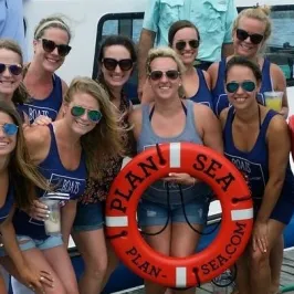 a group of people posing for the camera