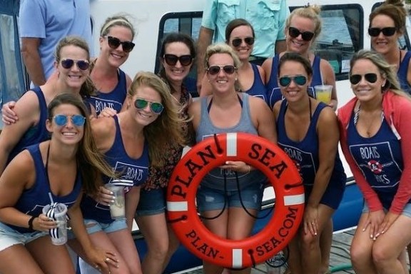 a group of people posing for the camera