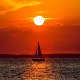 a sunset over a body of water